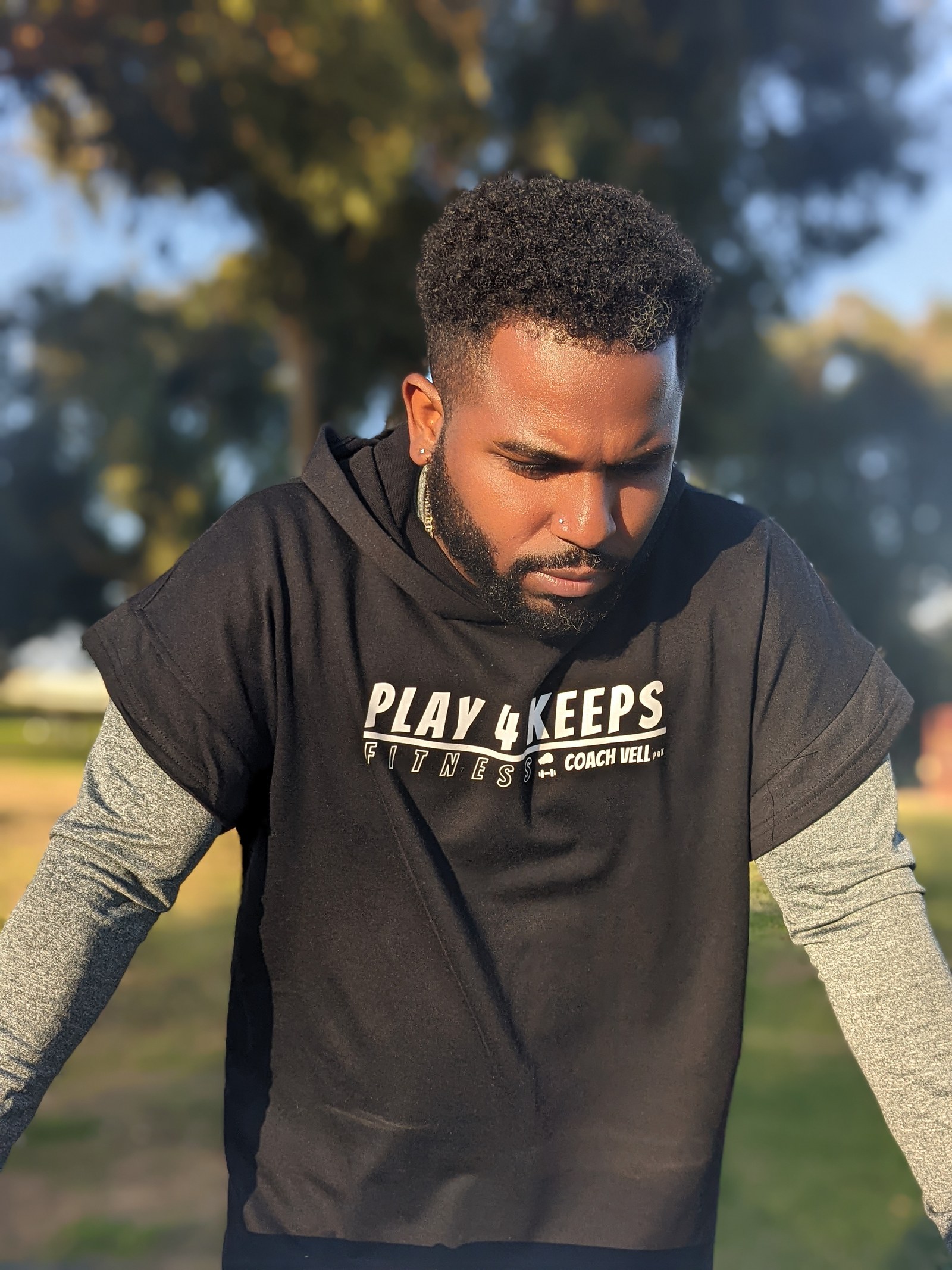 Coach Vell outdoors before a training session