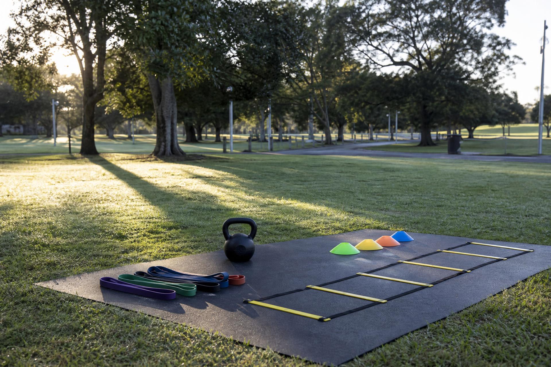 Outdoor training setup in a park at sunrise